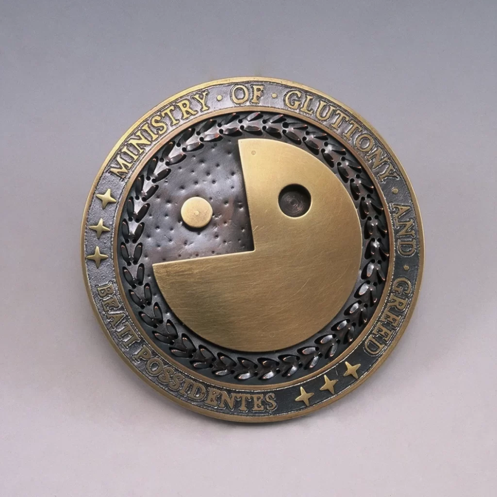 gluttony and greed belt buckle front