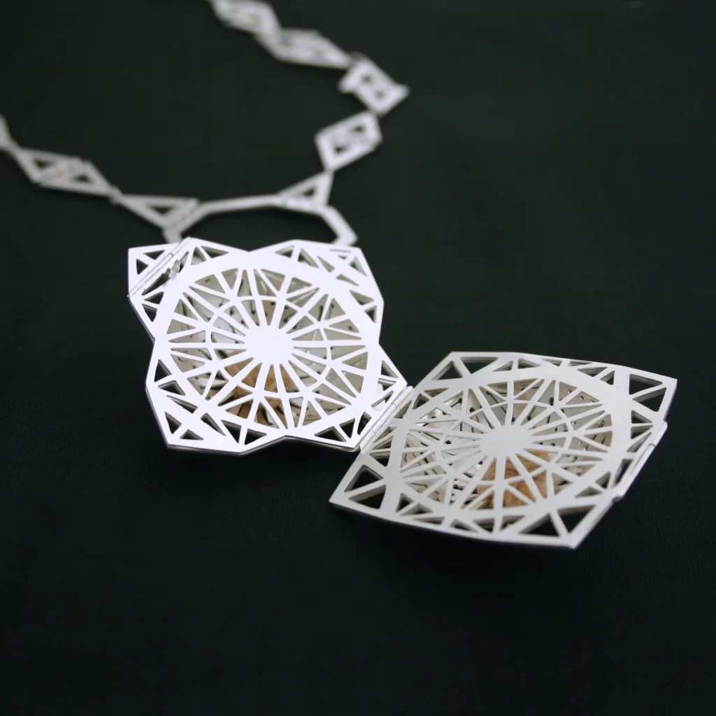 two scents amulet closeup half open