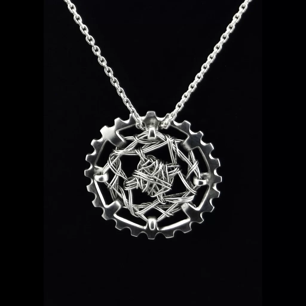 gear and wire pendant