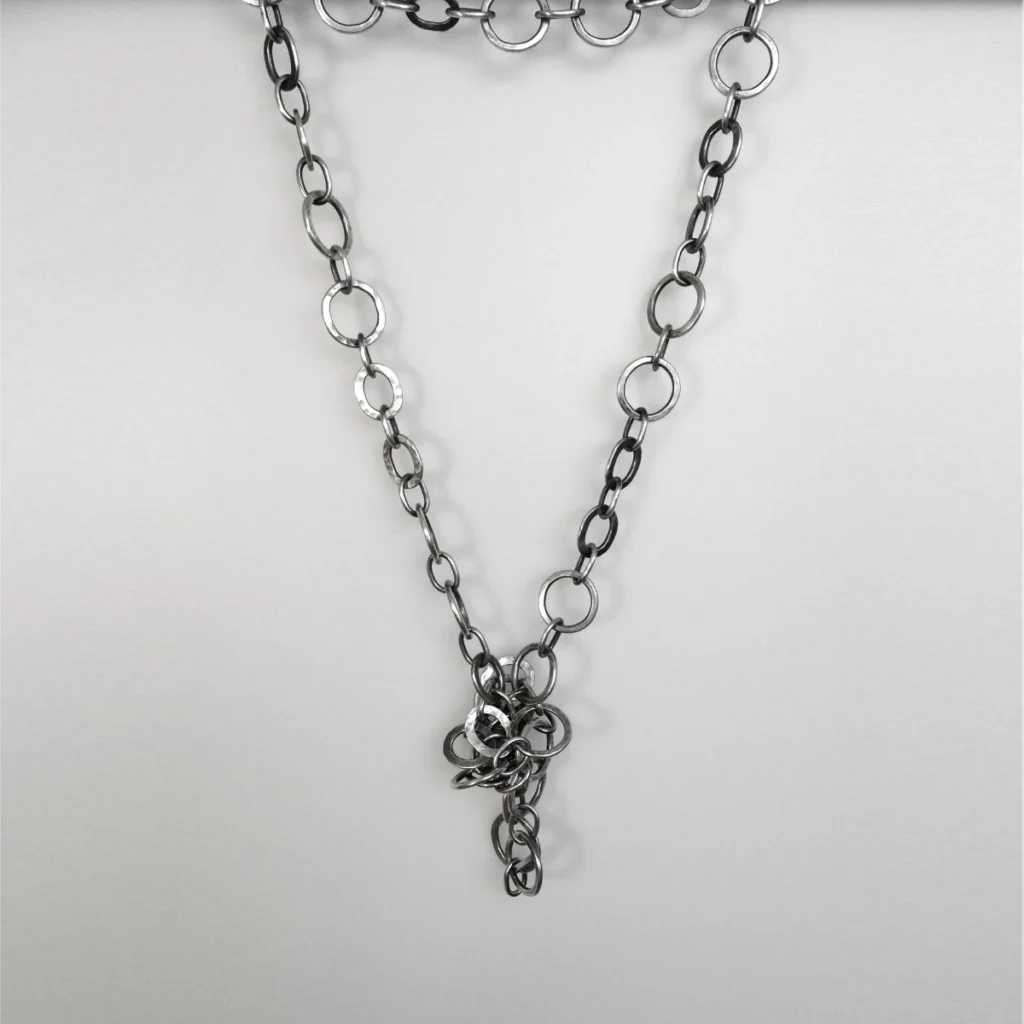 circles and ovals necklace in a knot