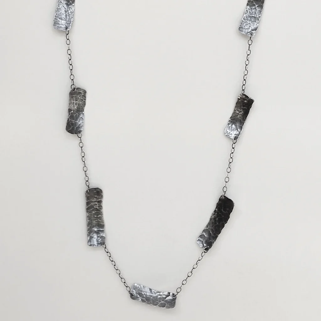 greek goddess necklace closeup