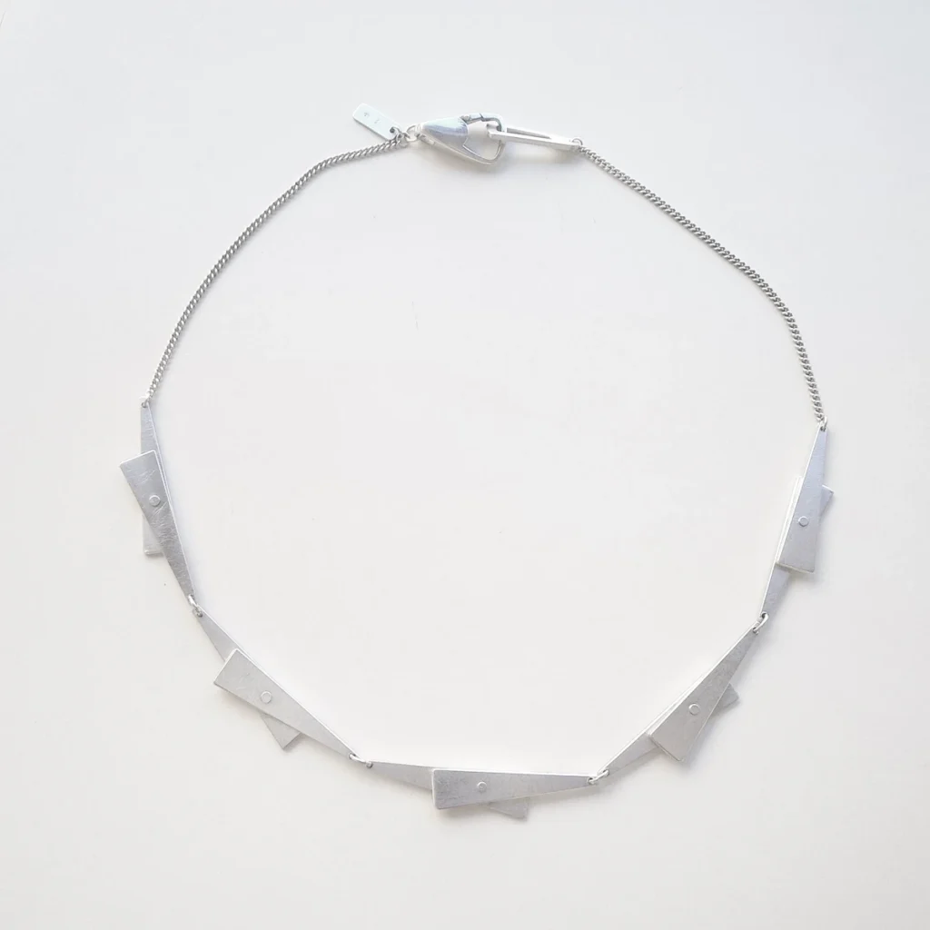 riveted triangles necklace
