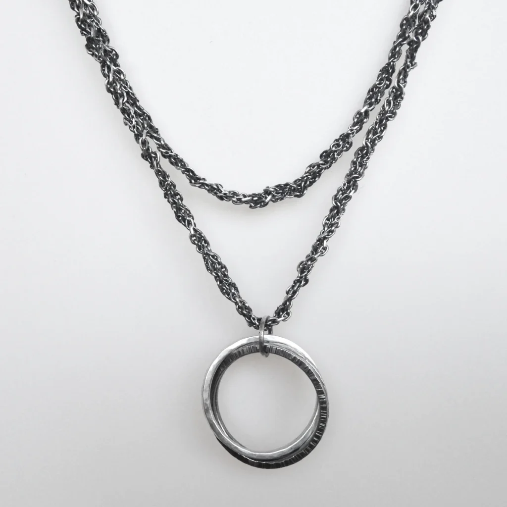 three rings pendant necklace closeup